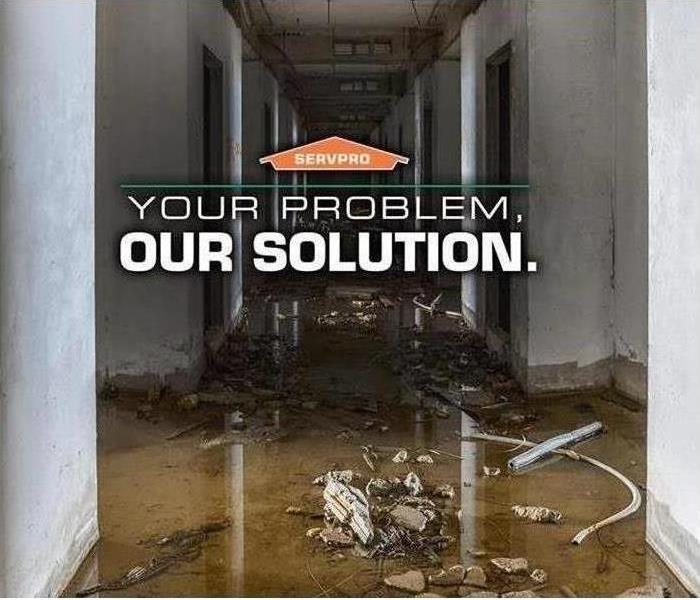 hallway with debris and water standing with YOUR PROBLEM. OUR SOLUTION. overlayed
